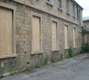empty property security wooden boarded up building